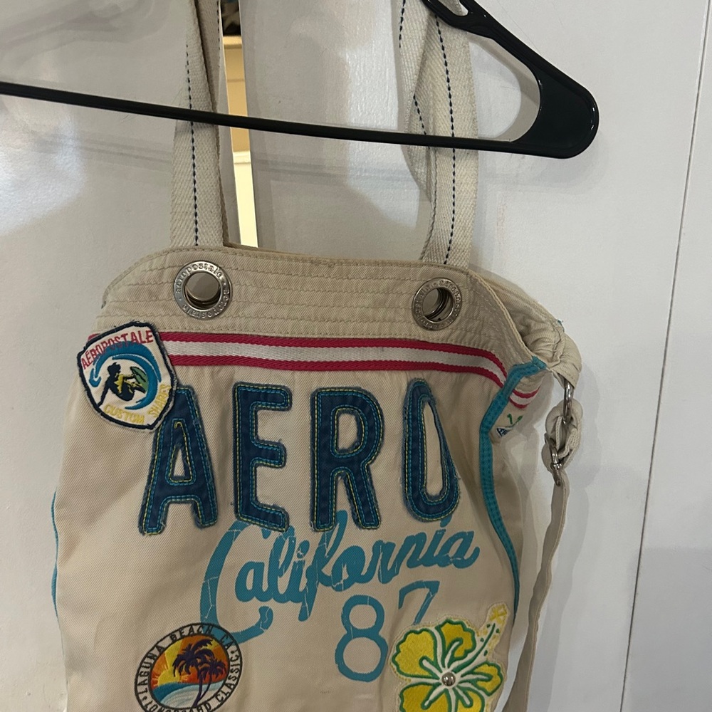 Aeropostale Cream Canvas Tote with Teal Applique Lettering